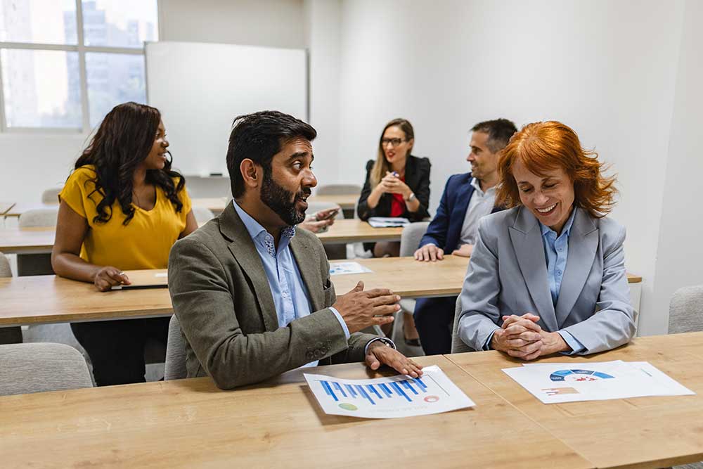 economics-essays Academics in a university classroom